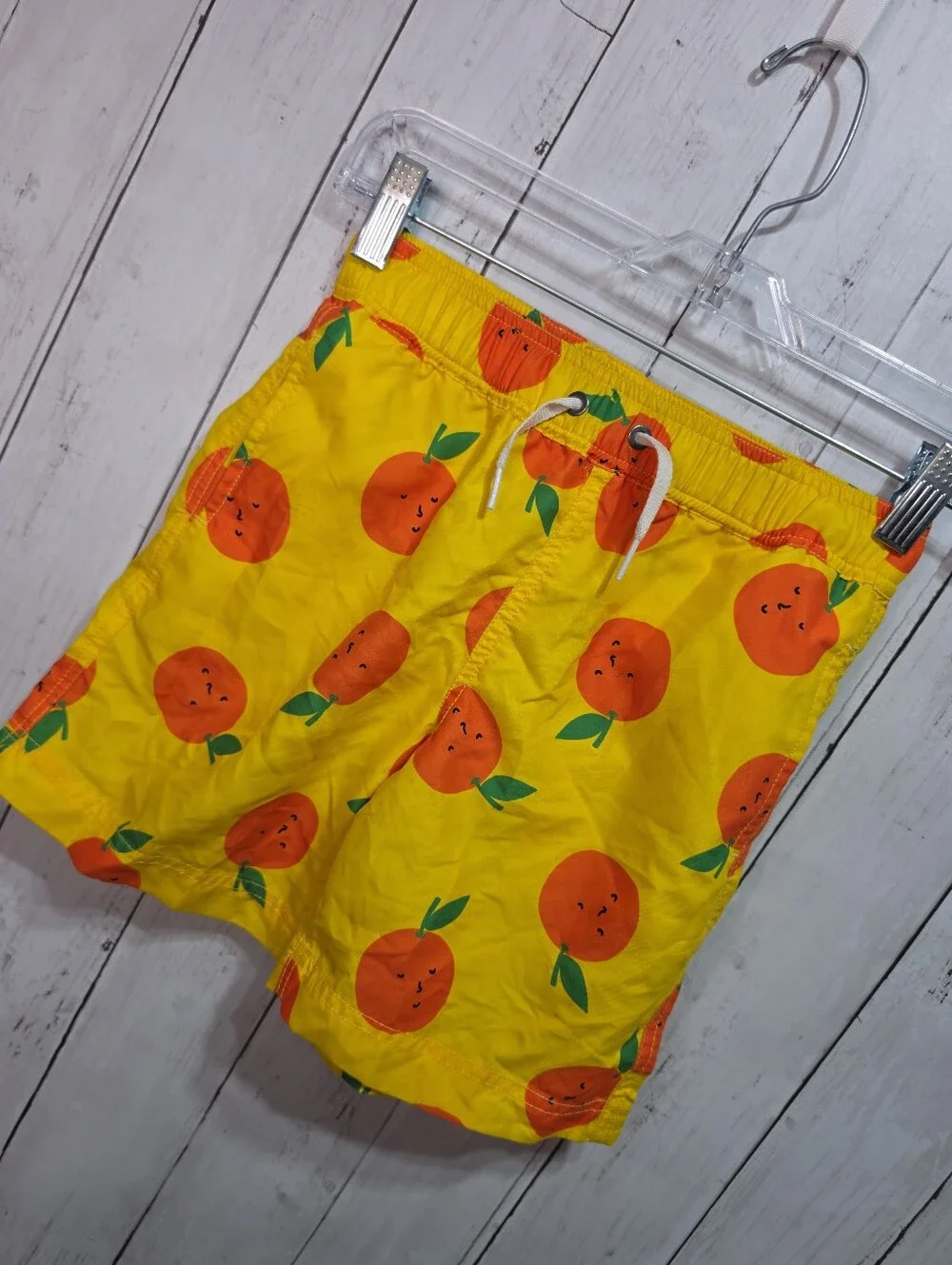Hanna Andersson Boys Yellow Oranges Print Sunblock Swim Trunks Shorts Size 6-7.
